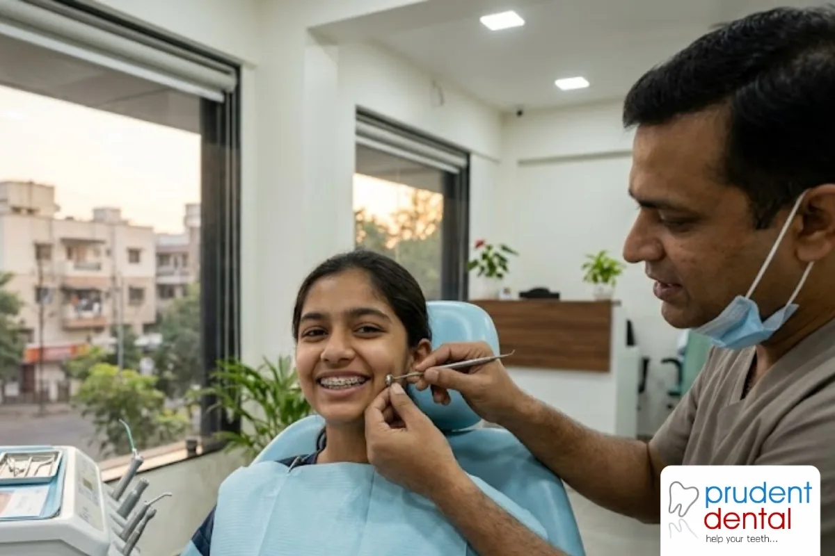Metal braces and a clear aligner tray side by side, two of the main orthodontic options