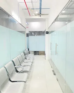 Clean, modern treatment corridor at the clinic