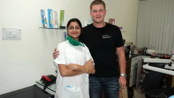 Dr. Puja Bansal with a visiting international patient at the clinic