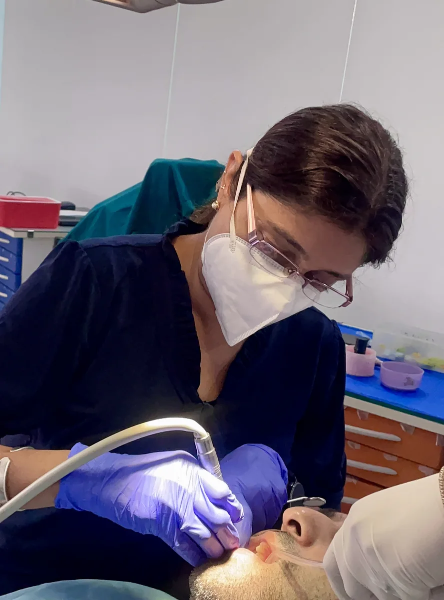 Patient receiving gentle dental care